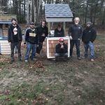 People standing in front of Roofing Project